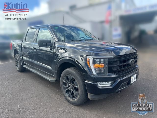 2023 Ford F-150 XLT in Black Metallic — front three-quarter view