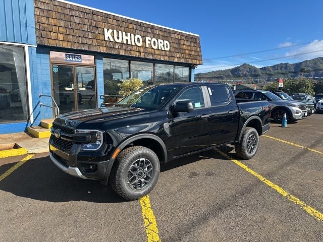 2025 Ford Ranger Lariat in Shadow Black — front three-quarter view