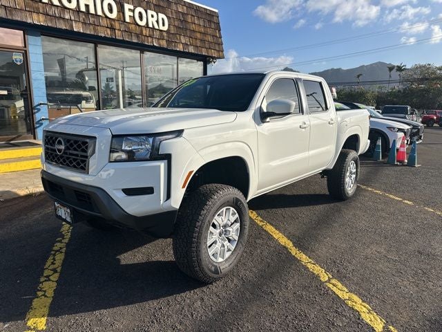 2024 Nissan Frontier SV in Glacier White — front three-quarter view